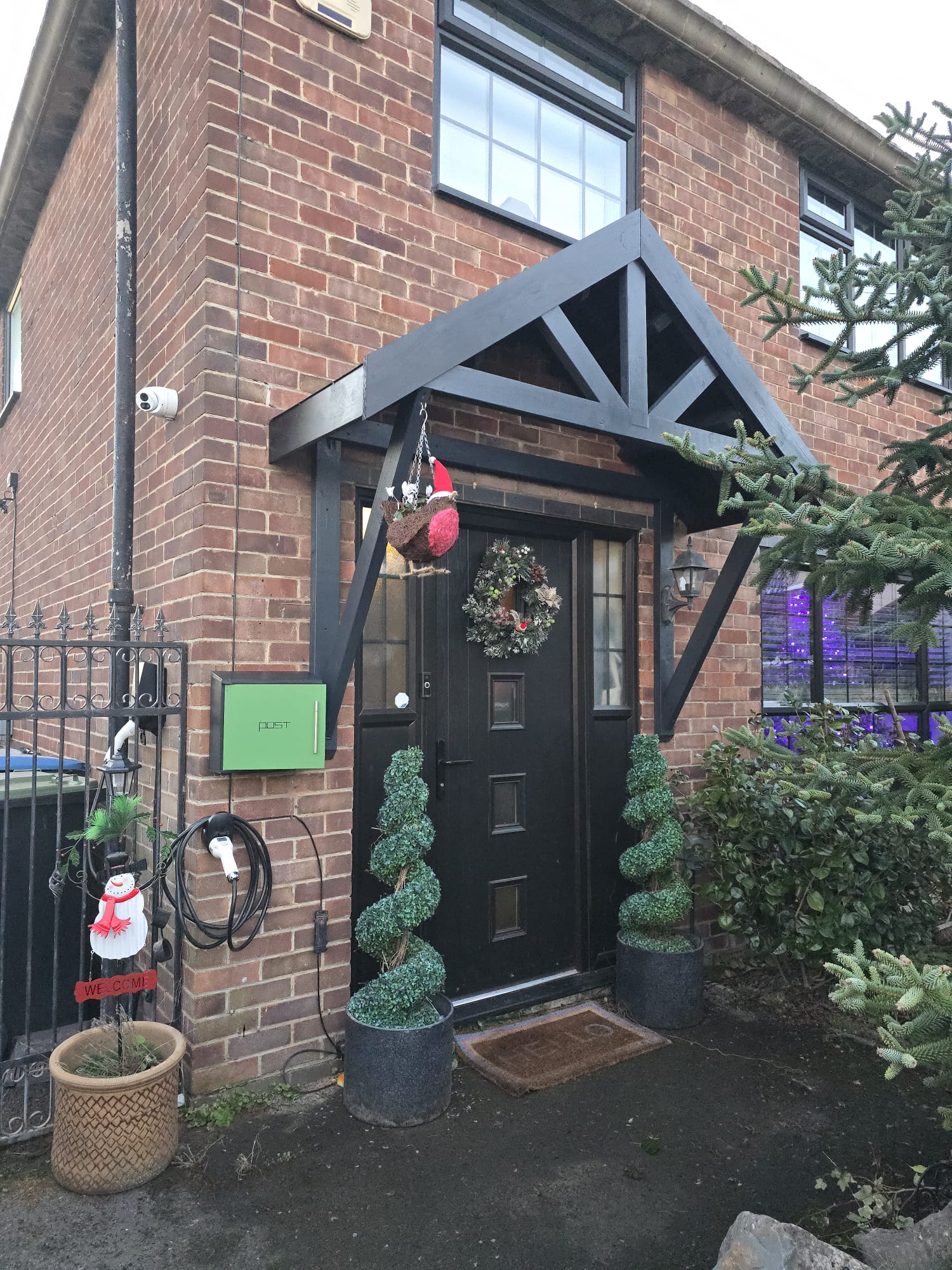 Exterior timber porch and front door joinery
