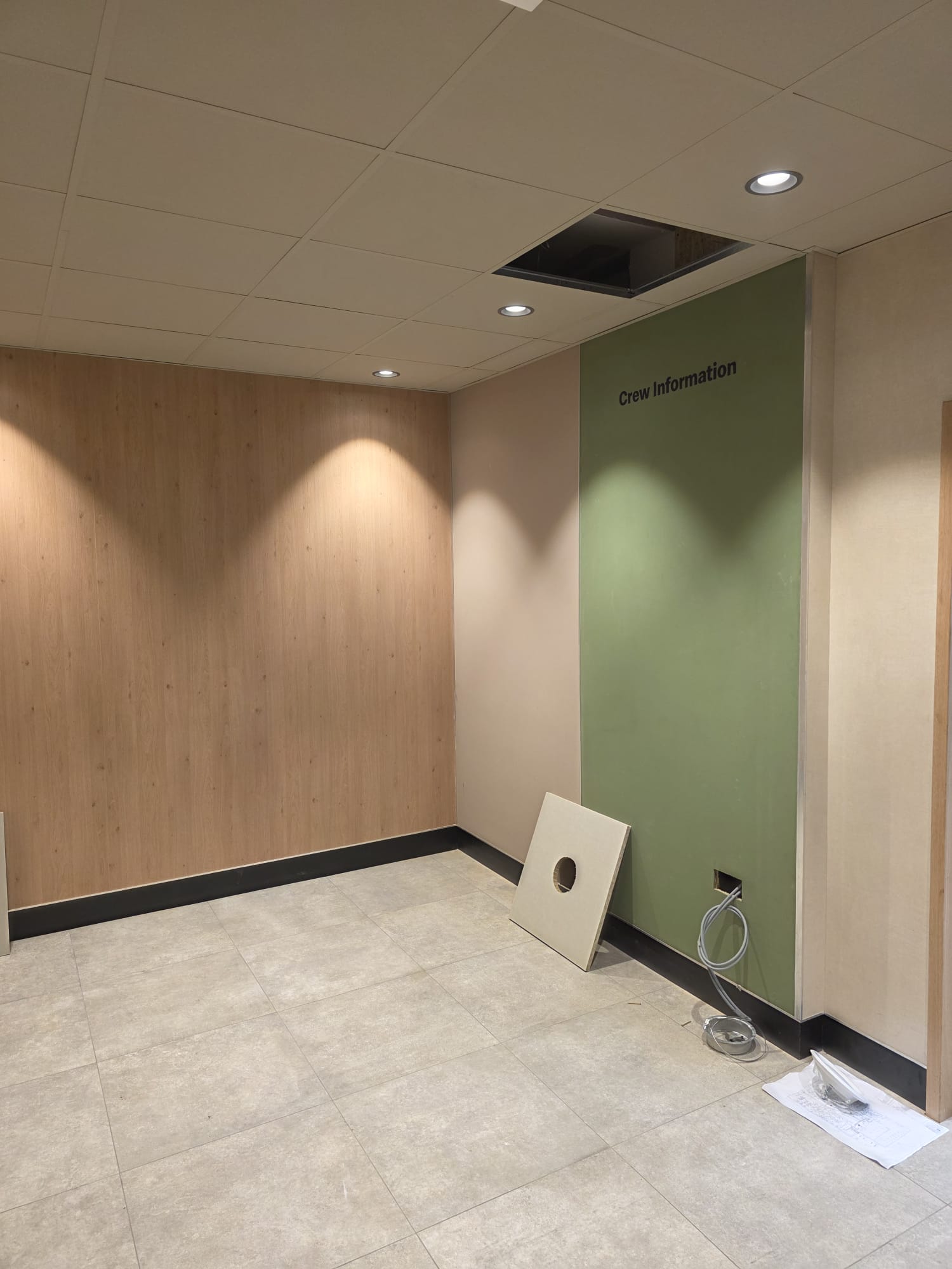 Completed room with wall cladding and ceiling panels