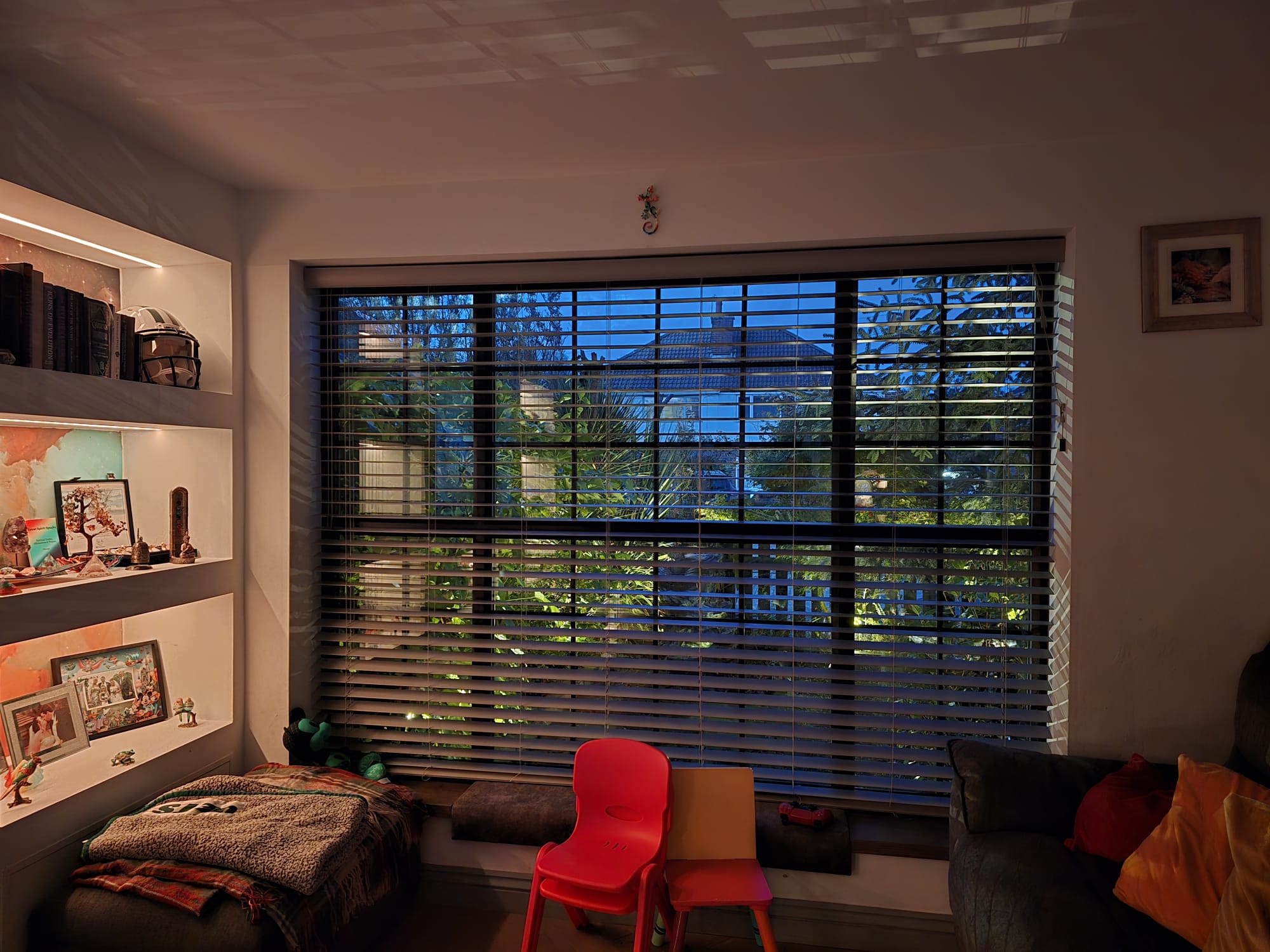 Living room media wall and window area